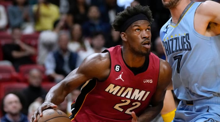 Heat wing Jimmy Butler drives past a defender